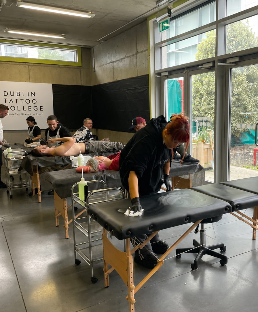 Learning to tattoo inside the Dublin Tattoo College studio